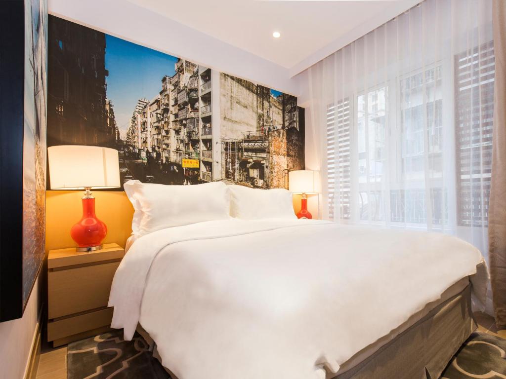Voodi või voodid majutusasutuse Caravel Hotel toas