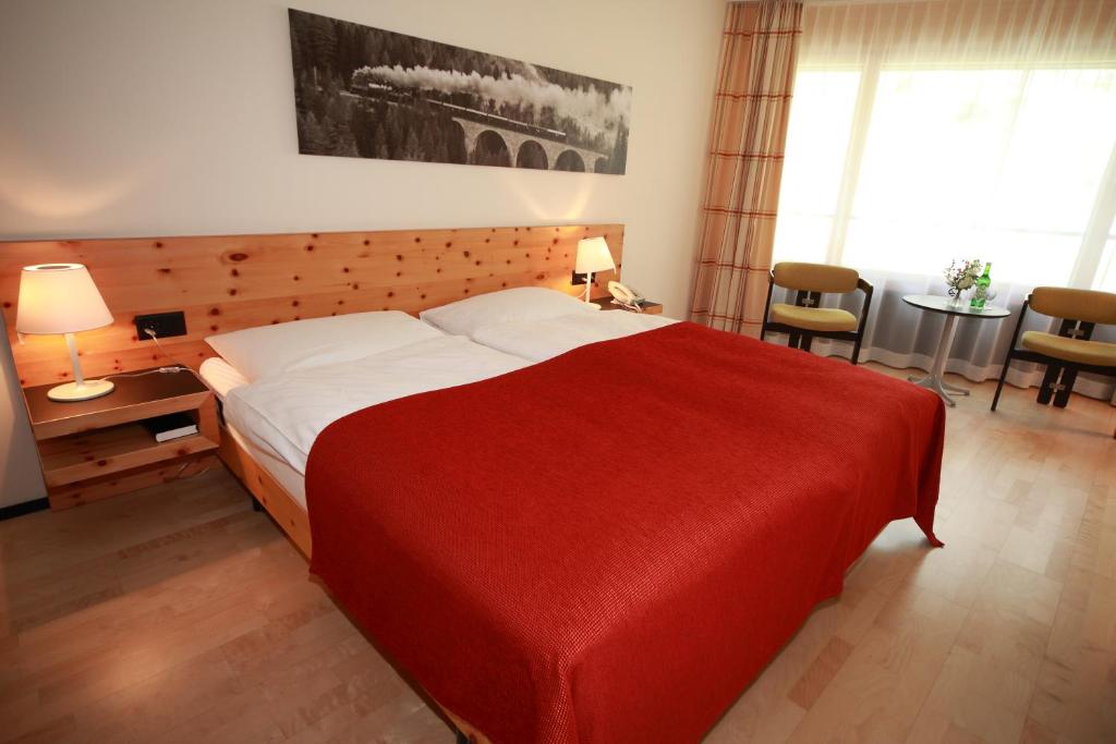 Cama o camas de una habitación en Hotel Albula & Julier