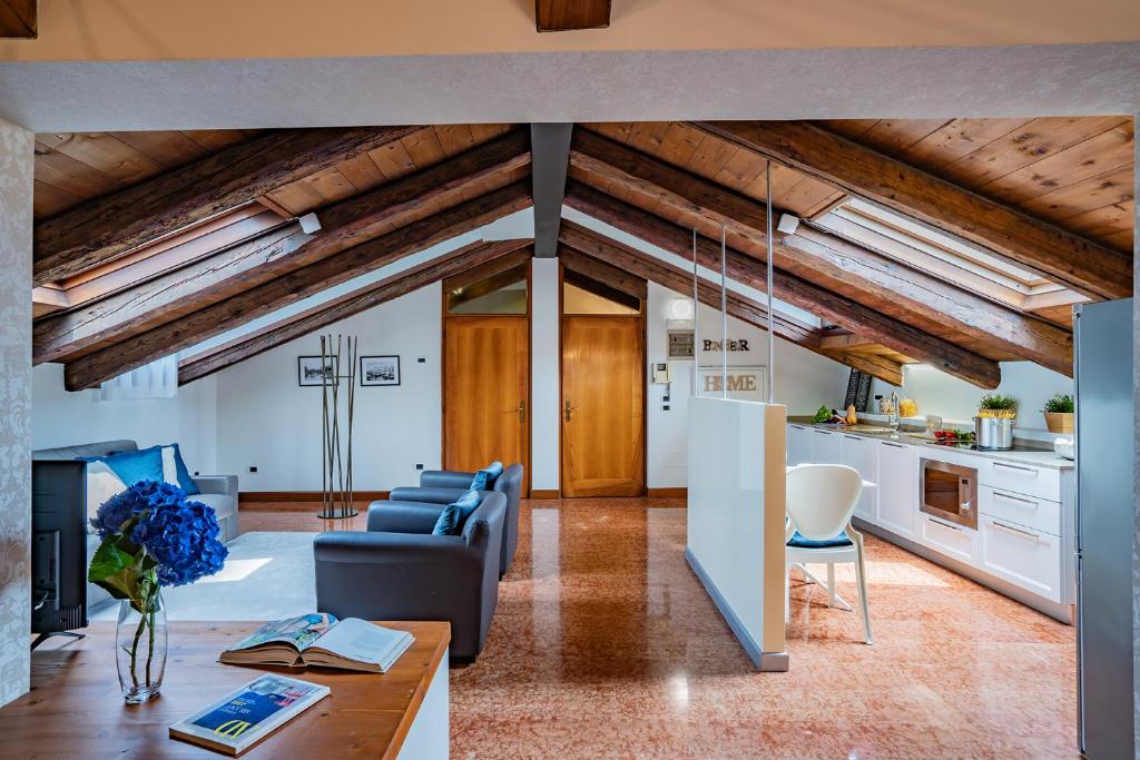 a living room with a couch and a table at Ca' Del Monastero 9 Collection Spacious Apartment up to 5 Guests in Venice