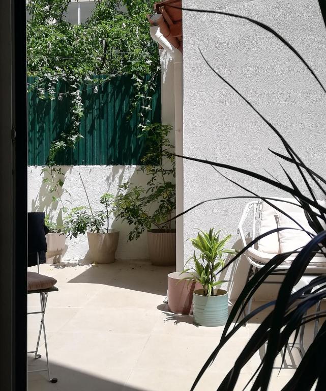 Apartamento encantador com pátio