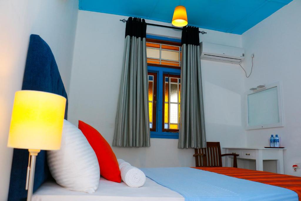 Postel nebo postele na pokoji v ubytování Villa 92 City Stay