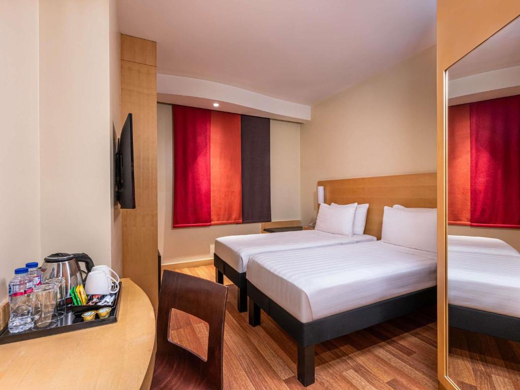 ALMSAKN ALOLA HOTEL COMPANY 
