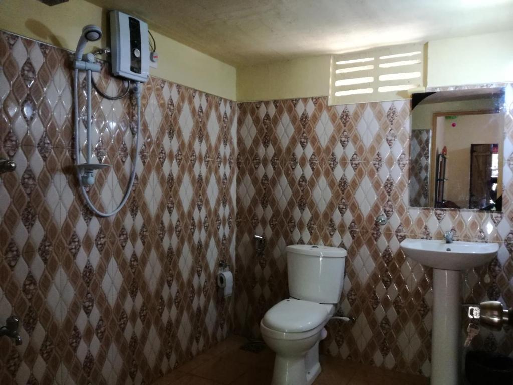 Koupelna v ubytování Pinthu Home Stay