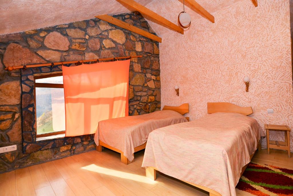 Voodi või voodid majutusasutuse Apaga Resort toas