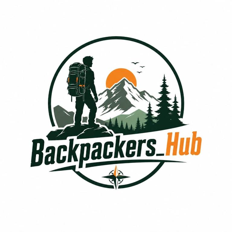 a man with a backpack standing on top of a mountain at Backpackers Hub in Dimapur