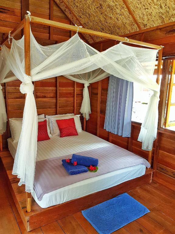 Кровать или кровати в номере Lipe Beach Resort
