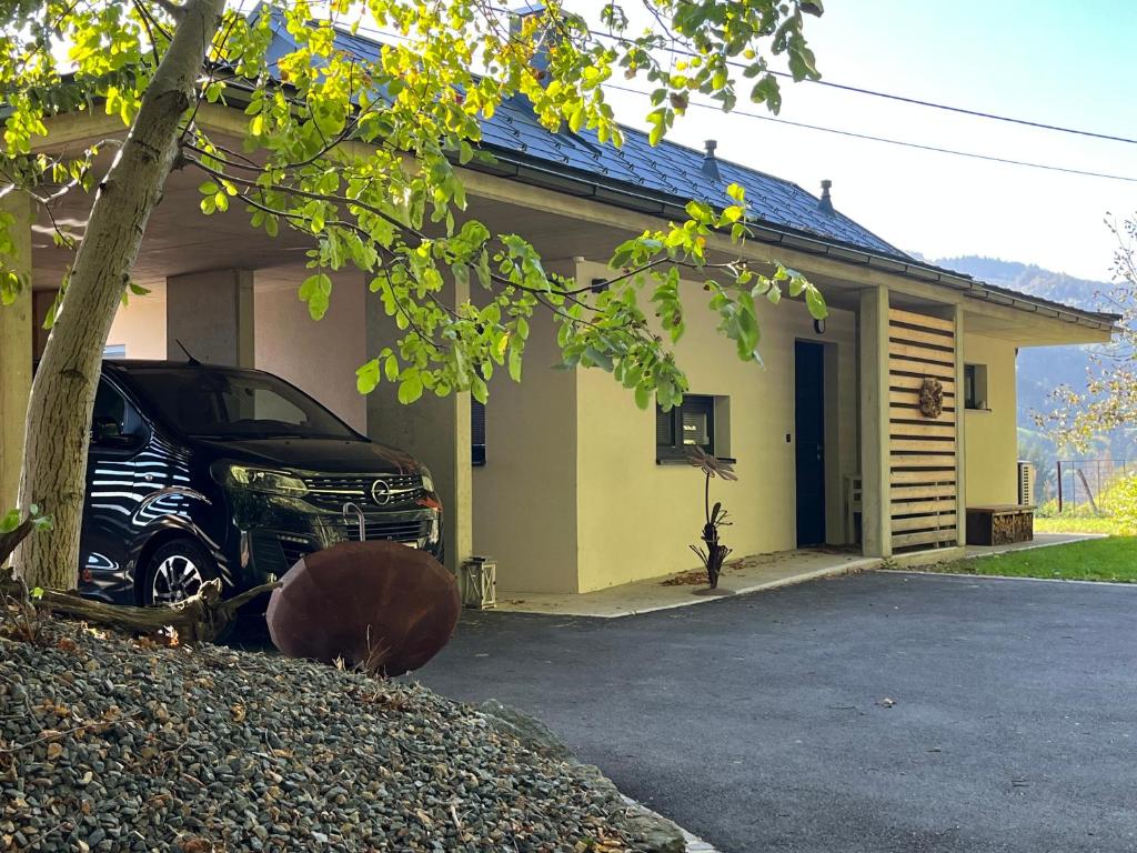 a car parked in front of a house at Haus Nebel in Oberhaag