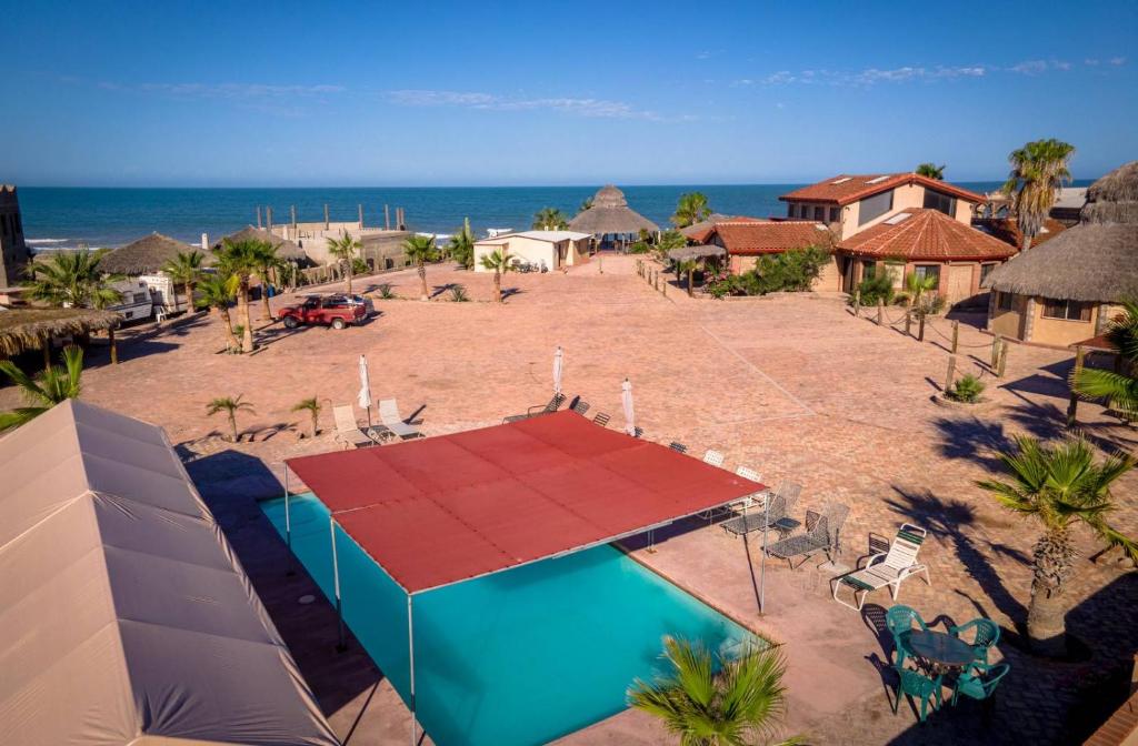 an aerial view of a resort with a swimming pool and the beach at Beach Studio 7 in San Felipe