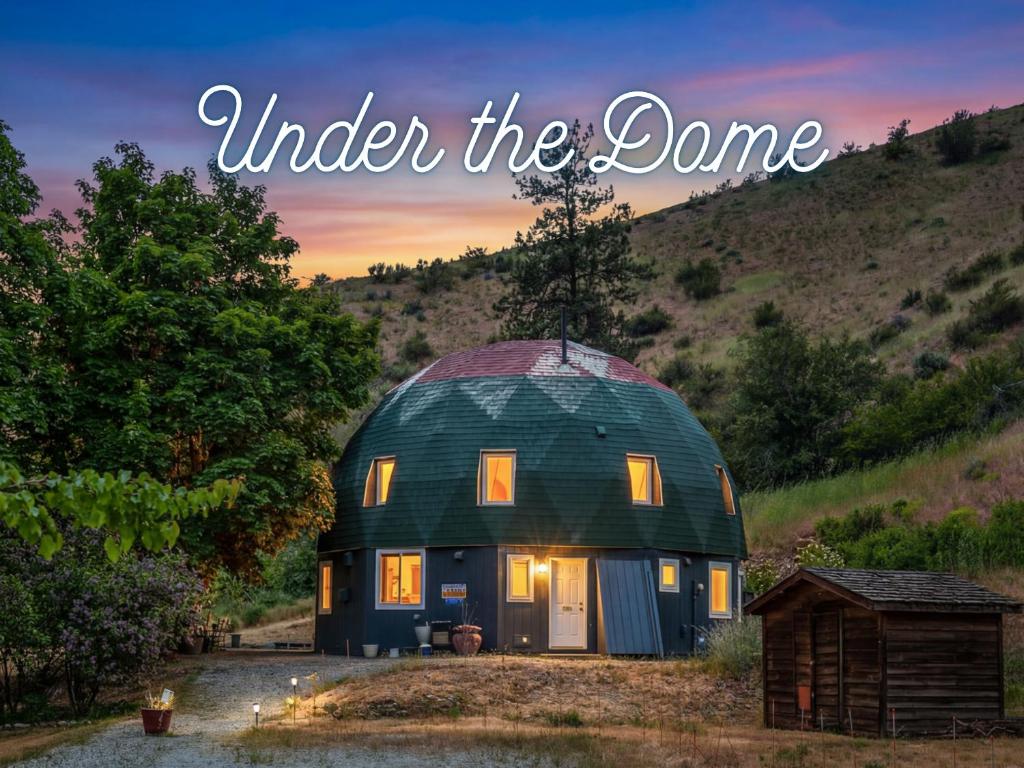 a green dome house with the words under the dome at 9 Minute Drive to the Lake in Chelan