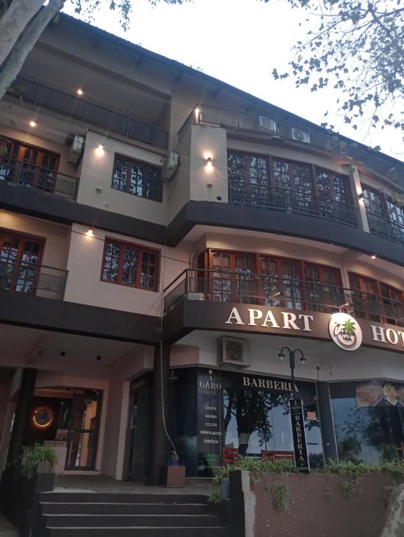 a part of a building with a sign on it at Apart Hotel Costanera Colon in Colón