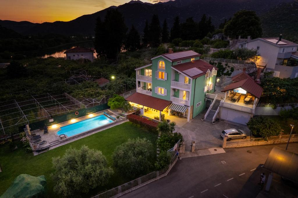 an aerial view of a house with a swimming pool at Villa Šolo in Ploče