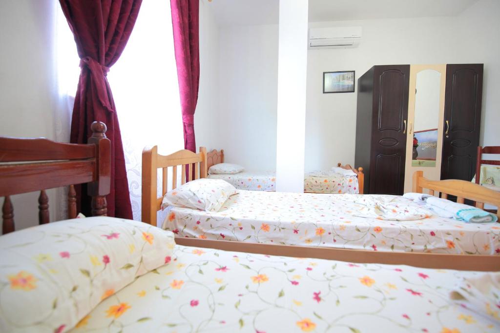 Postel nebo postele na pokoji v ubytování My Home Guest House