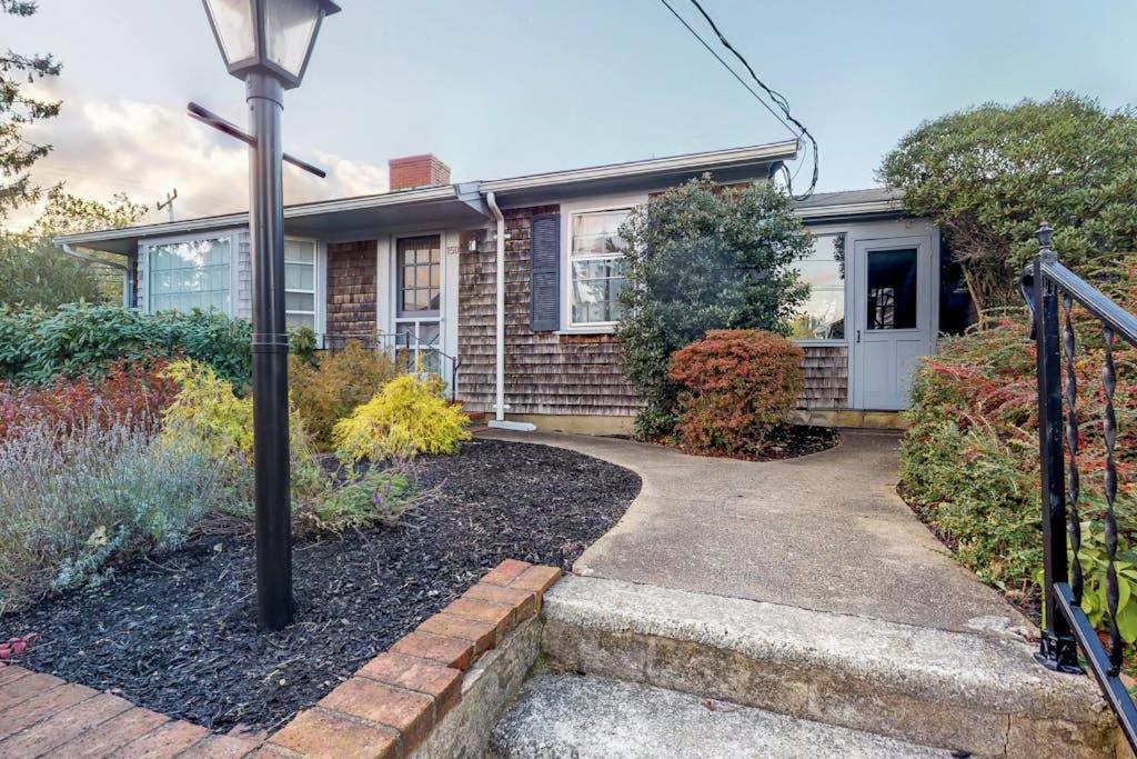 a brick house with a street light in front of it at Edgartown Cozy Corner in Edgartown