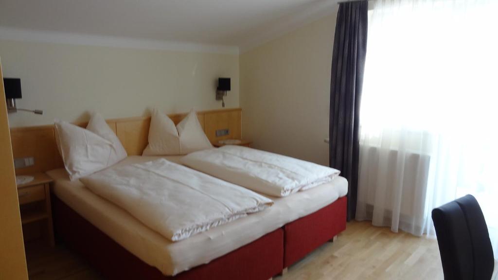 Postel nebo postele na pokoji v ubytování Appartements Gassner