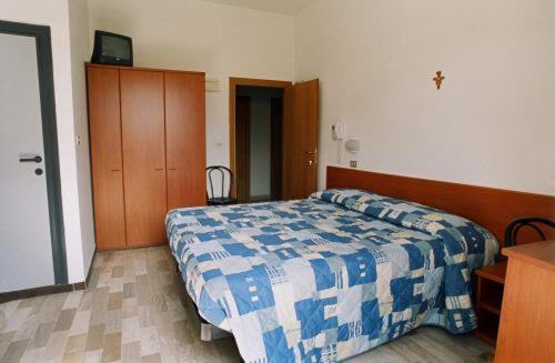 Postel nebo postele na pokoji v ubytování Hotel Trinidad