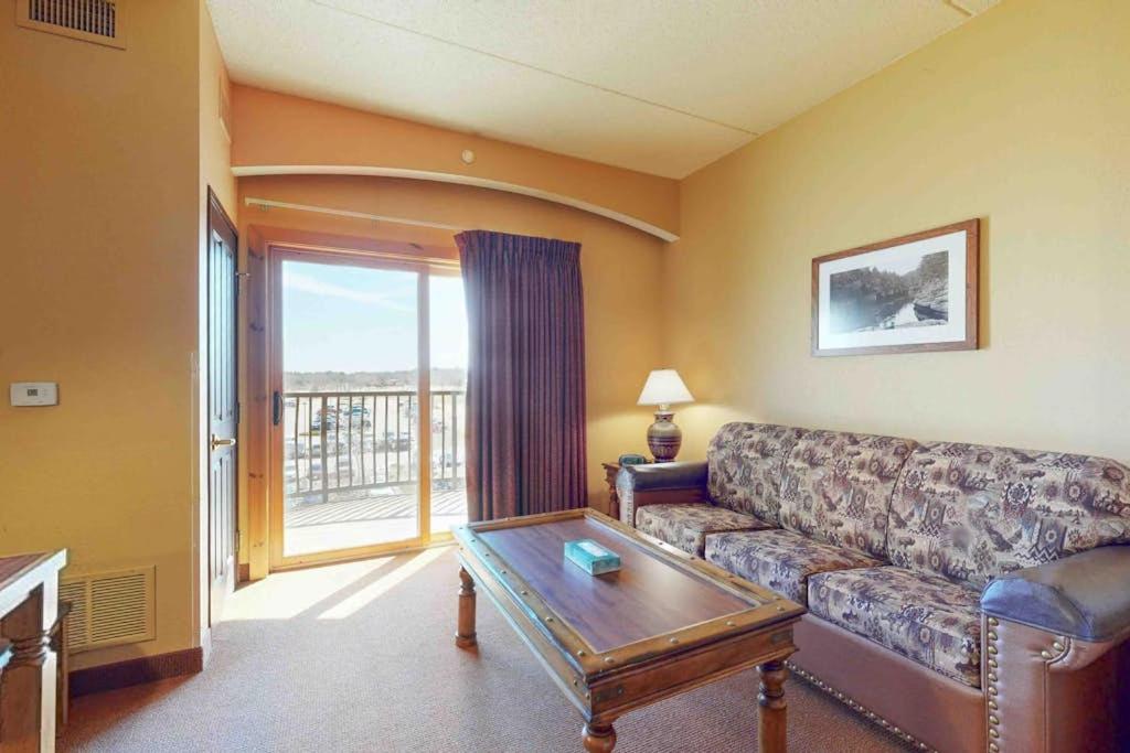 a living room with a couch and a table at Chula Vista Resort 2224 in Wisconsin Dells