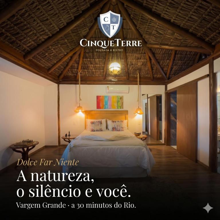 a poster for a hotel room with a bed at Cinque Terre Pousada & Bistrô in Rio de Janeiro