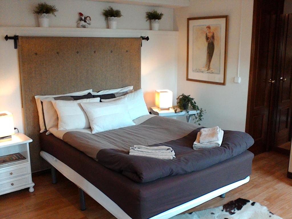 Postel nebo postele na pokoji v ubytování Villafranco Apartamentos