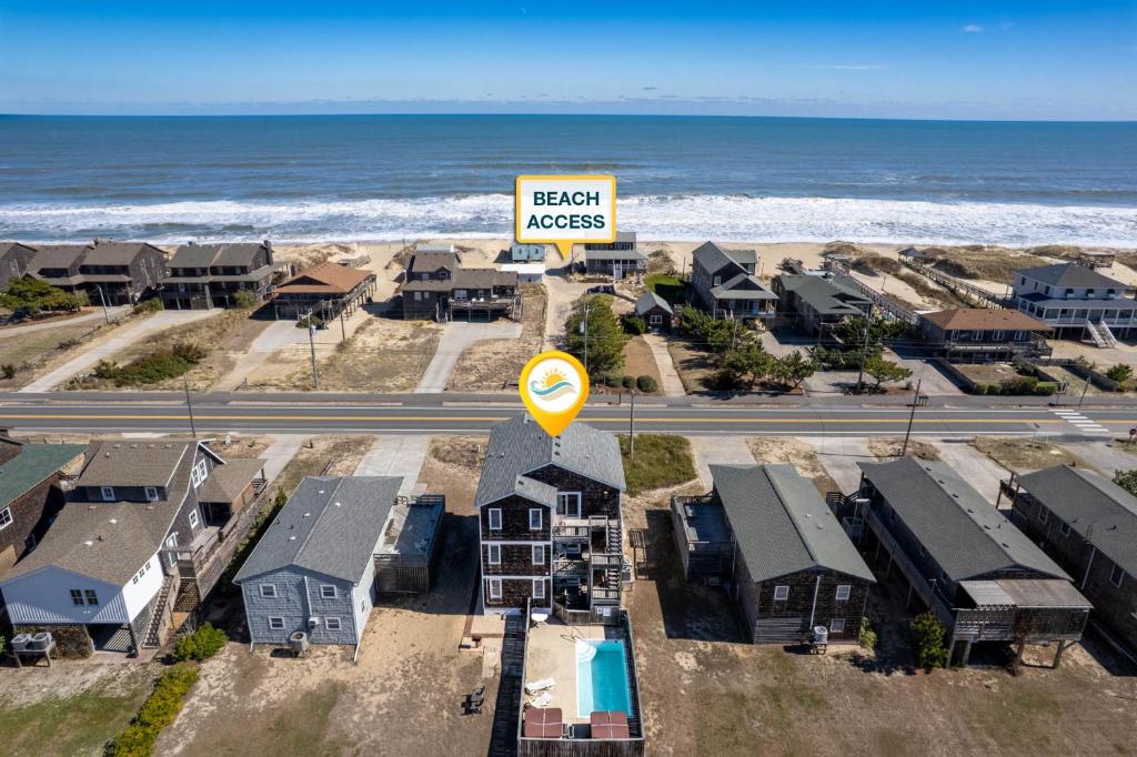 an overhead view of a beach house with a sign at 6151 - Once Upon a Tide in Nags Head
