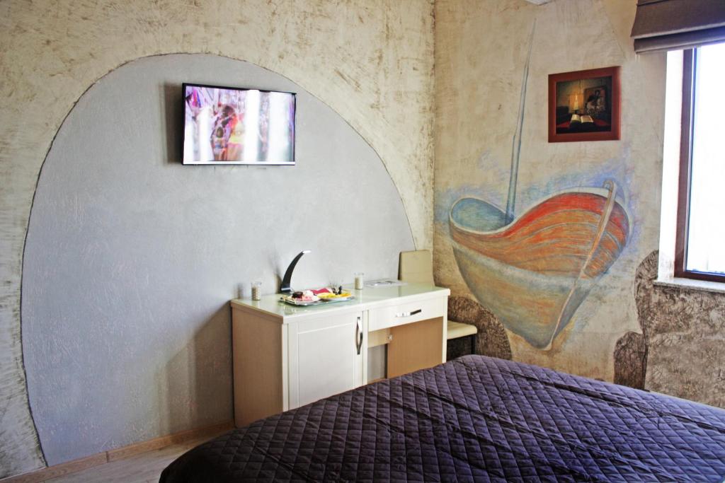 TV a/nebo společenská místnost v ubytování Hotel Wine Palace
