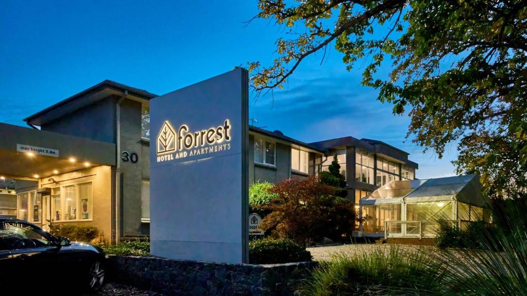 a sign for the front of a building at Forrest Hotel & Apartments in Canberra