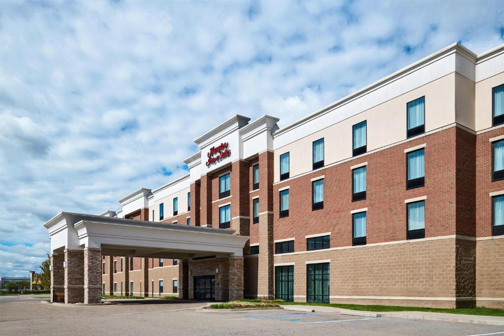 a rendering of the front of a hotel at Hampton Inn & Suites Detroit/Troy in Clawson