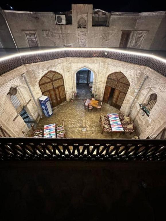 an overhead view of a living room in a building at Caravan Sarai XV century Mextar Ambar old town in Bukhara