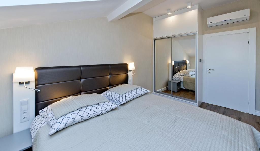 Posteľ alebo postele v izbe v ubytovaní Softly Residence
