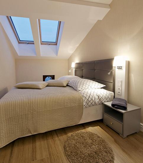 Posteľ alebo postele v izbe v ubytovaní Softly Residence