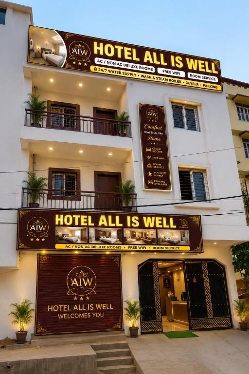 a hotel all is well sign in front of a building at Alliswell in Patna