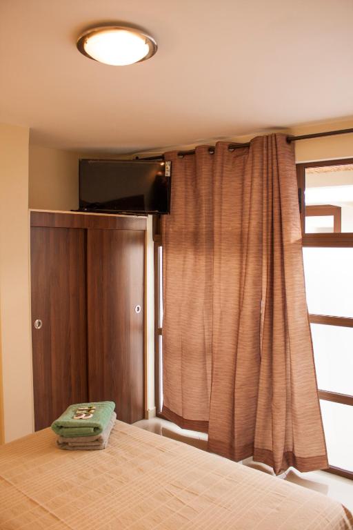 Voodi või voodid majutusasutuse Hostal Anpaymi Atacama toas