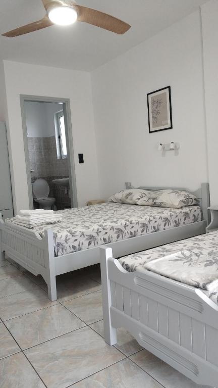 Llit o llits en una habitació de ΠΑΓΩΝΗΣ studios