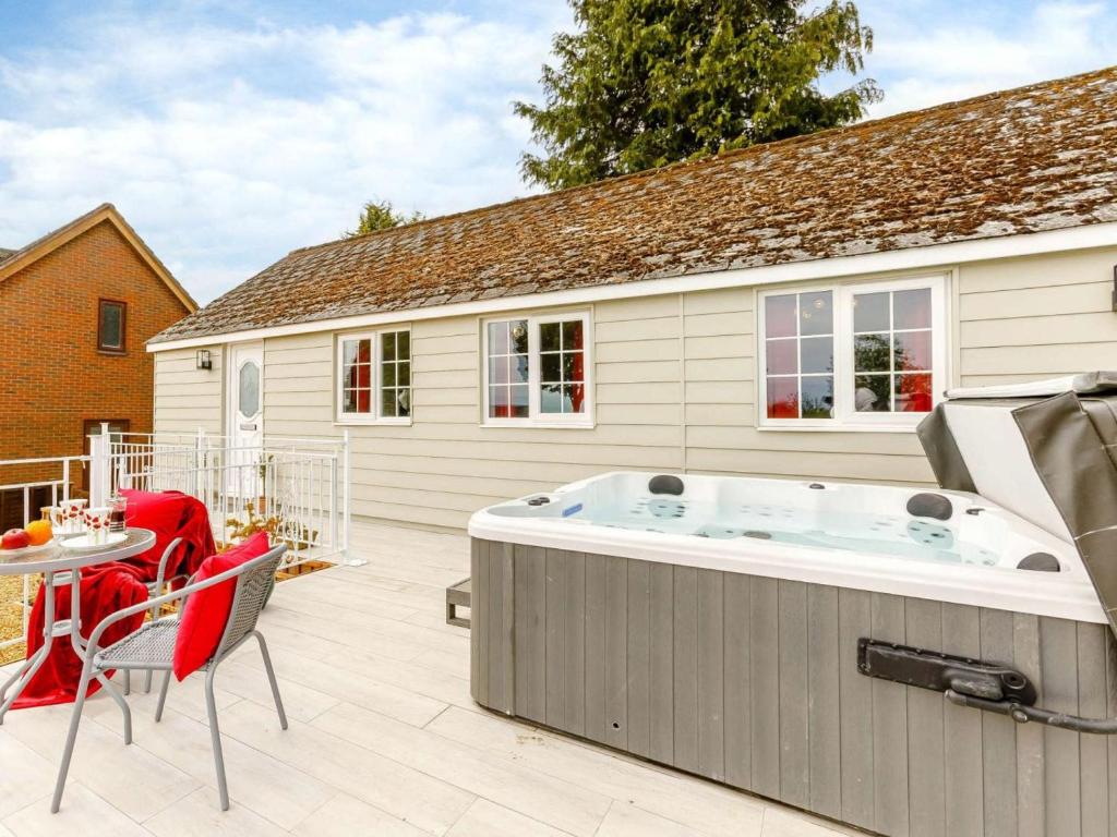a hot tub in the backyard of a house at 1 Bed in Cinderford oc-88271 in Cinderford