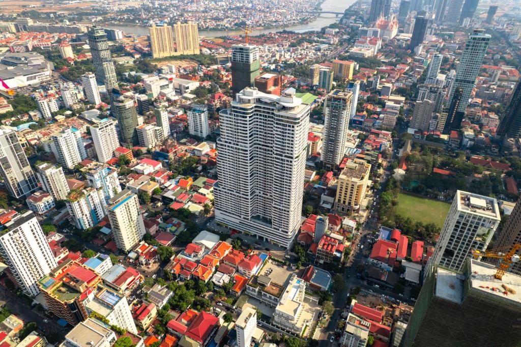 an aerial view of a city with tall buildings at Le Conde Maison in Phnom Penh