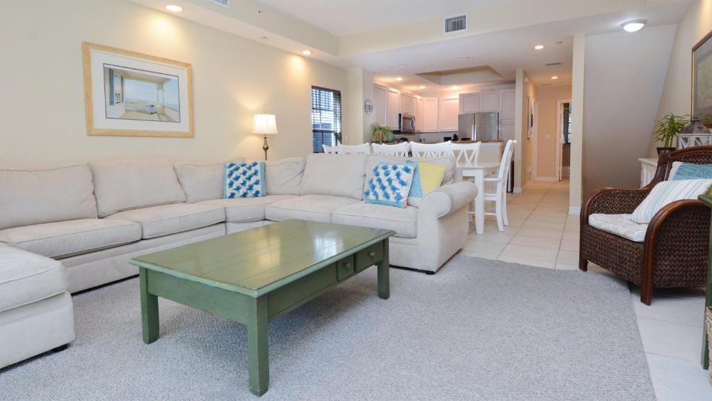 a living room with a couch and a coffee table at 612 Mariners Club in Key Largo