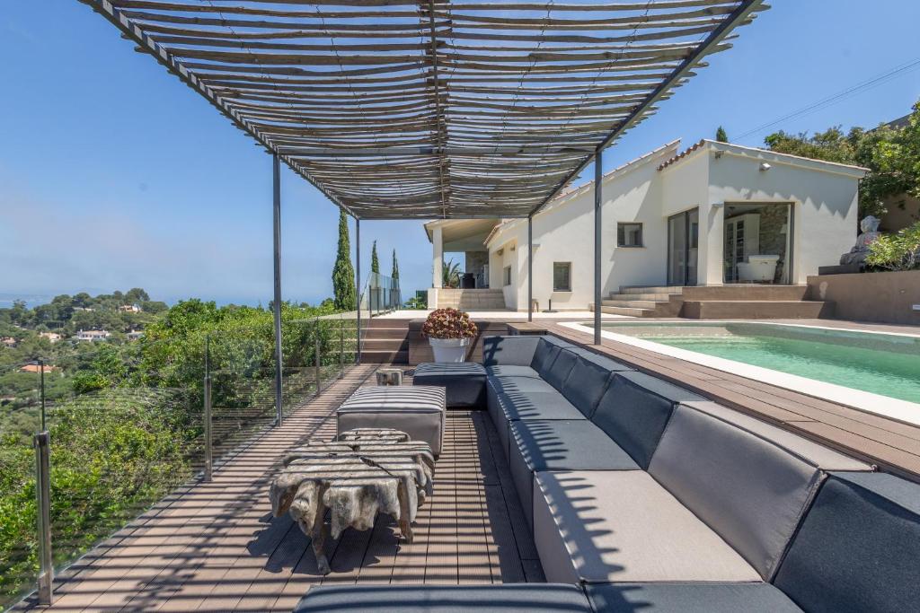 a view of a house with a swimming pool at Sa Punta 99 F2 in Begur