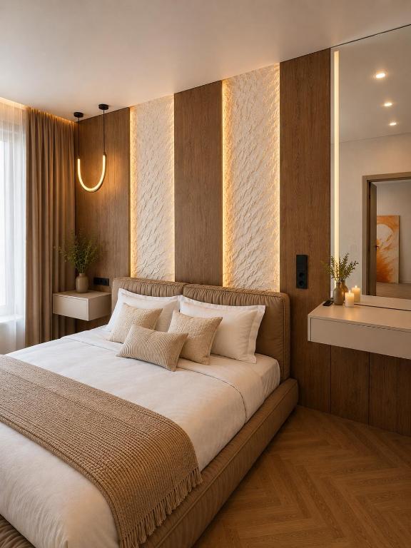 a bedroom with a large bed with white sheets at Great Apart - Вид на Дніпро - 6 поверх - укриття на території ЖК in Kyiv