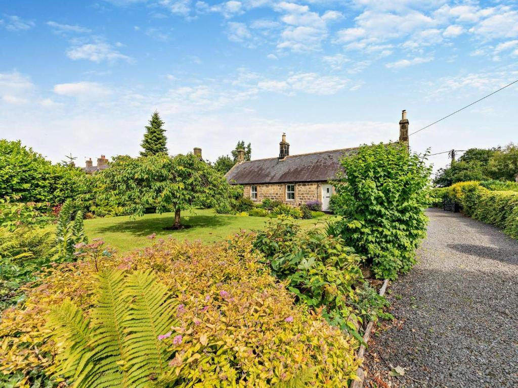 an old house in the middle of a garden at 2 Bed in Morpeth oc-cn049 in Acklington