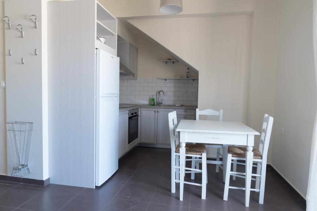 Kuchyň nebo kuchyňský kout v ubytování Elounda Sea Suites