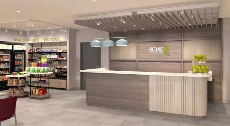 a store with a counter in a store at Home2 Suites By Hilton Logan in Logan