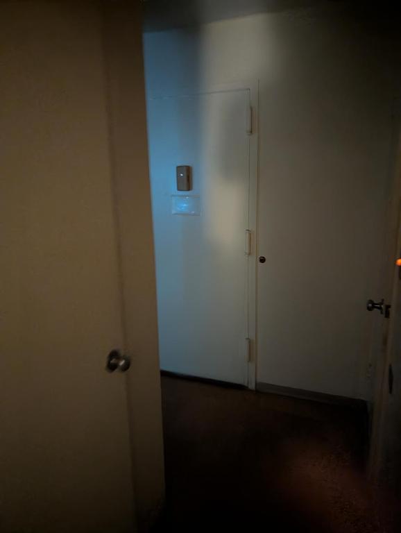 an empty room with a white door and a doorway at Lucky get away in Poughkeepsie