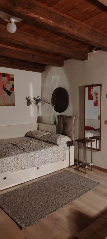 Tempat tidur dalam kamar di Cenedam