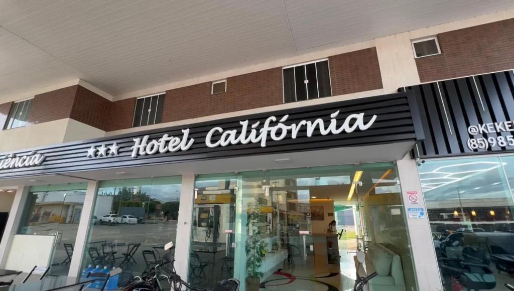 a store front with a sign for the hotel california at Hotel Califórnia in Canindé