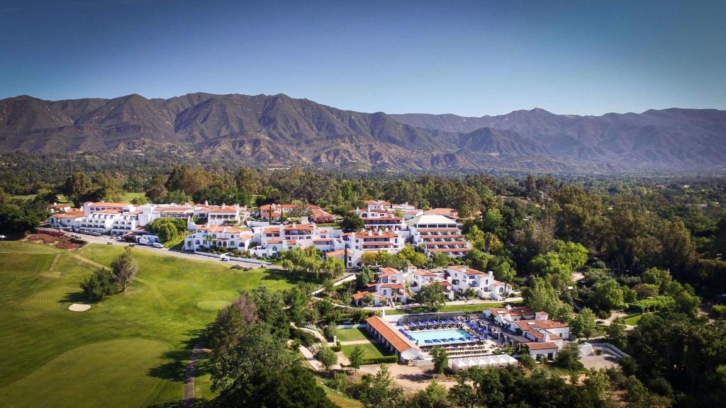 an aerial view of a resort with mountains in the background at Ojai Valley Inn in Ojai