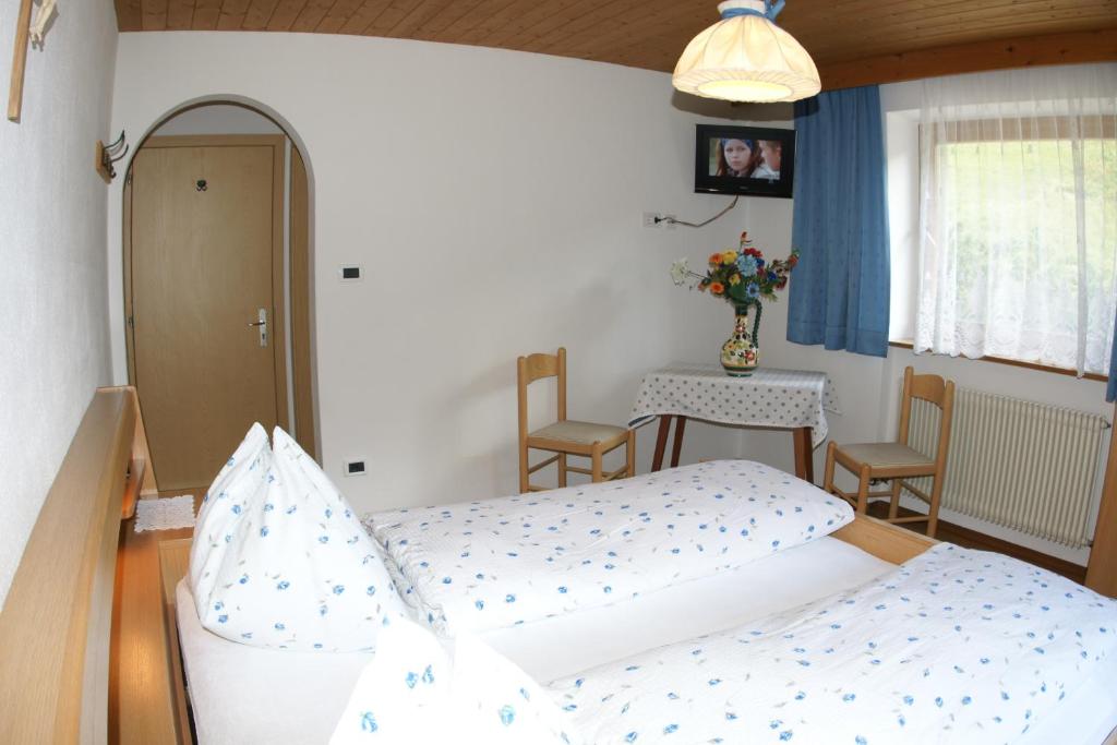 Postel nebo postele na pokoji v ubytování Hotel Alcialc