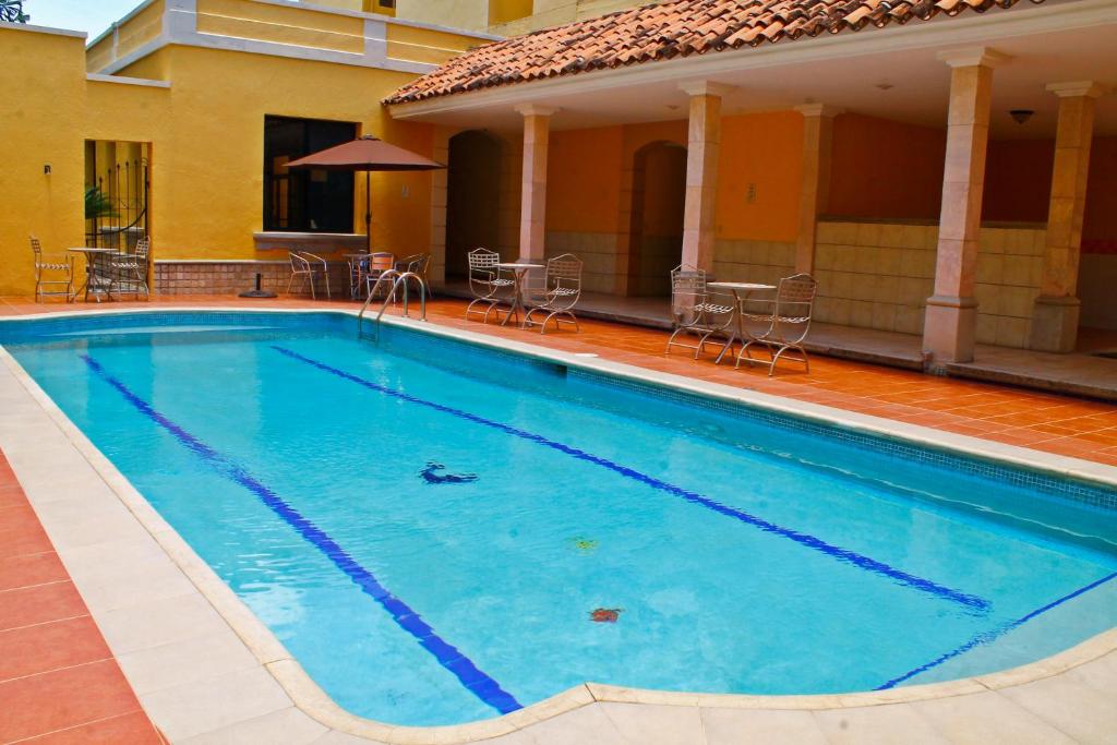 Πισίνα στο ή κοντά στο Hotel Mac Arthur