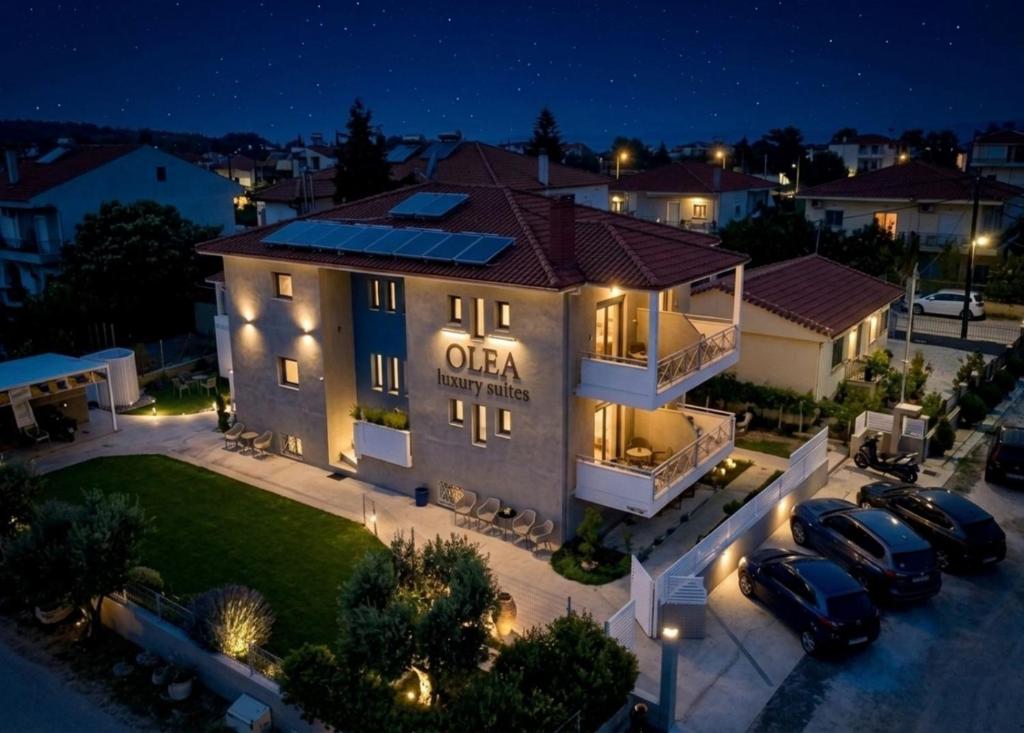 an aerial view of a house at night with lights at Olea Luxury Suites in Asprovalta