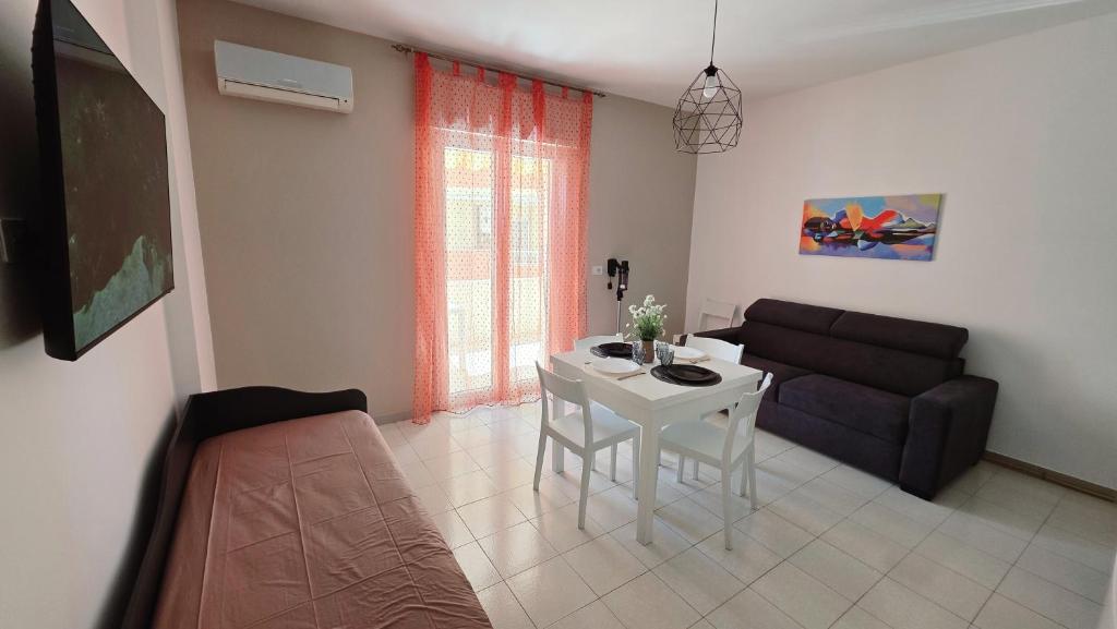 a living room with a couch and a table at Viben House in Gallipoli