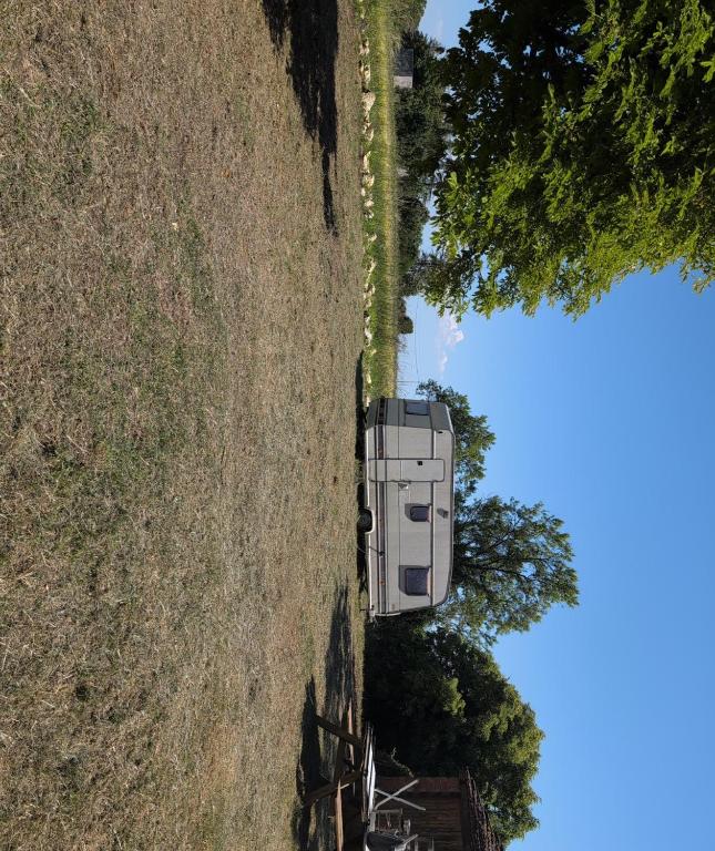 a van parked on the side of a hill at Au soleil in Virac