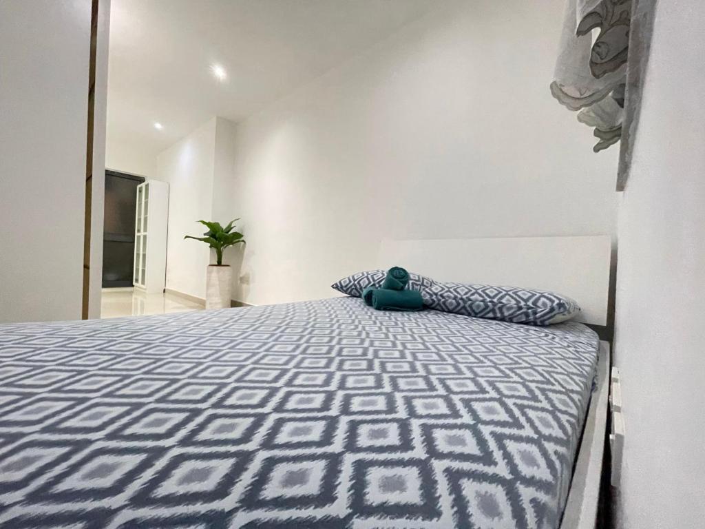 a bedroom with a large bed in a room at sliema promenade in Sliema